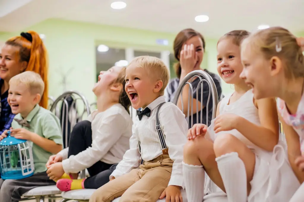 Kids Laughing Together at a Party